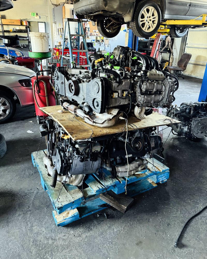Stack of replacement Subaru engines ready for customer engine swaps at Farrell's Automotive