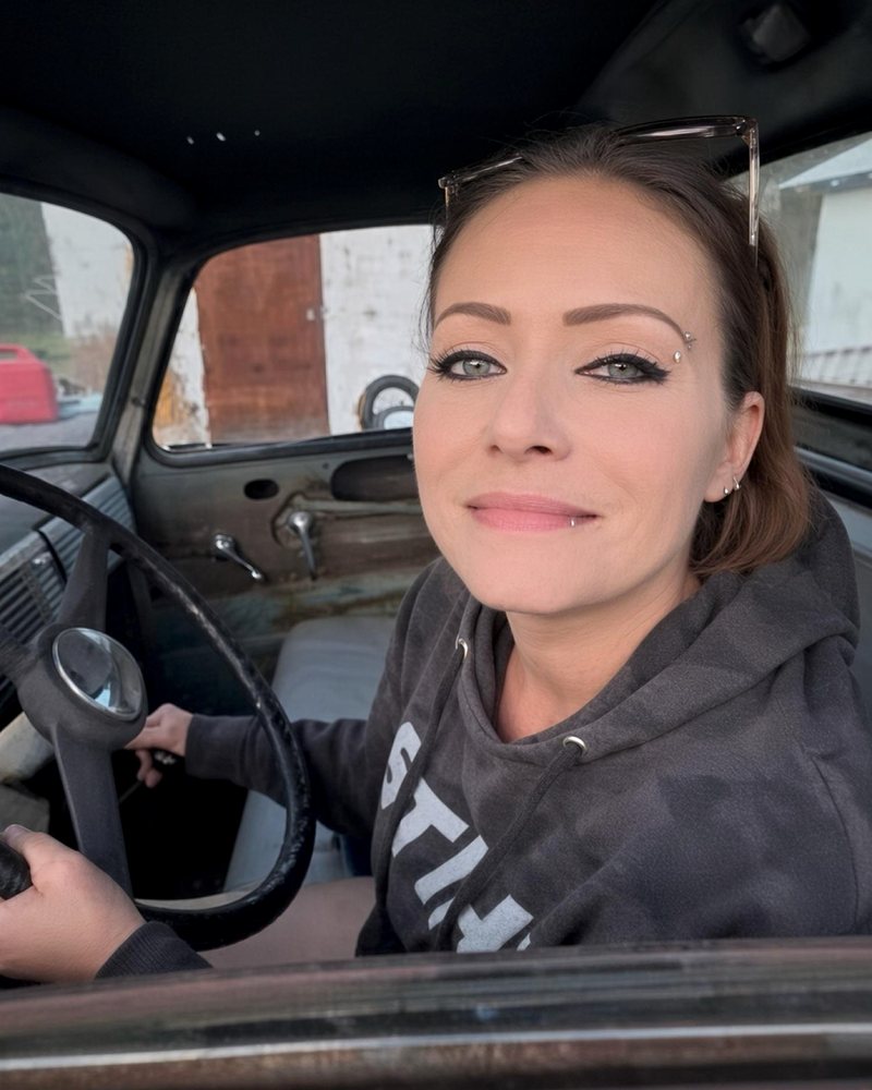 Kaila behind the wheel of a family friend's 1950 Chevy truck.